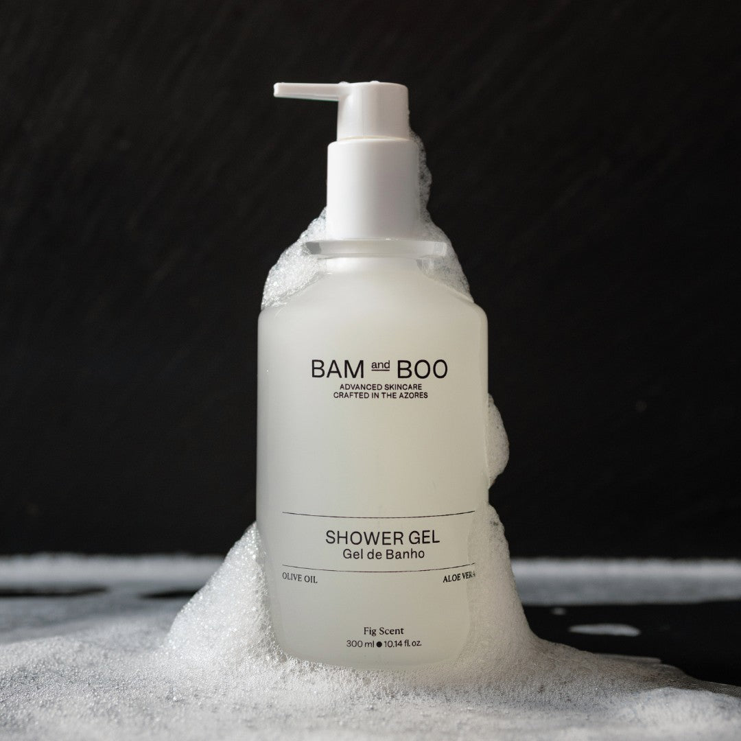 BAM and BOO shower gel bottle with pump on a black background. Natural ingredients vegan and eco-friendly amenities.